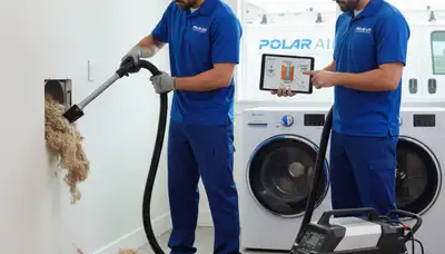 Technician cleaning dryer vent for AC repair service in Brooklyn, NY home
